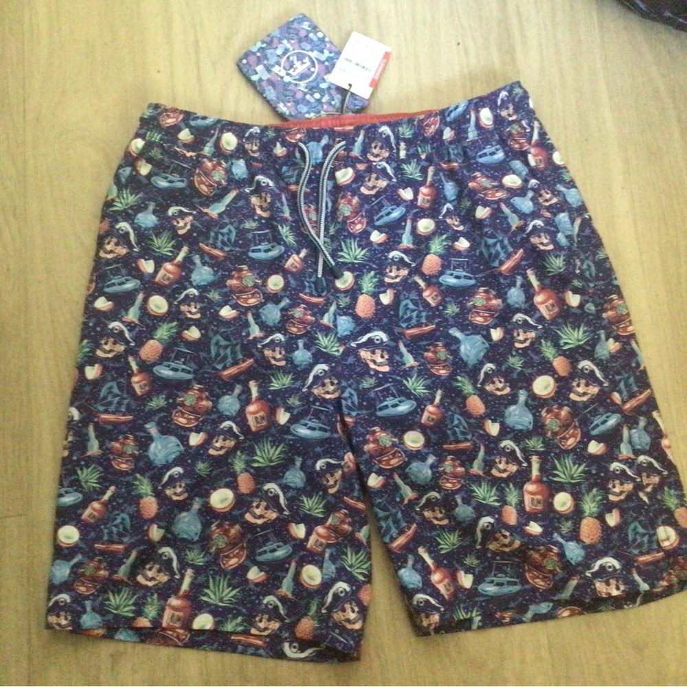 Peter Millar Blue and Orange Board Shorts with Playful Pattern